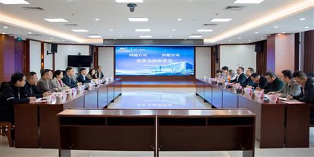 覃振華帶隊到四建公司開展工作交流